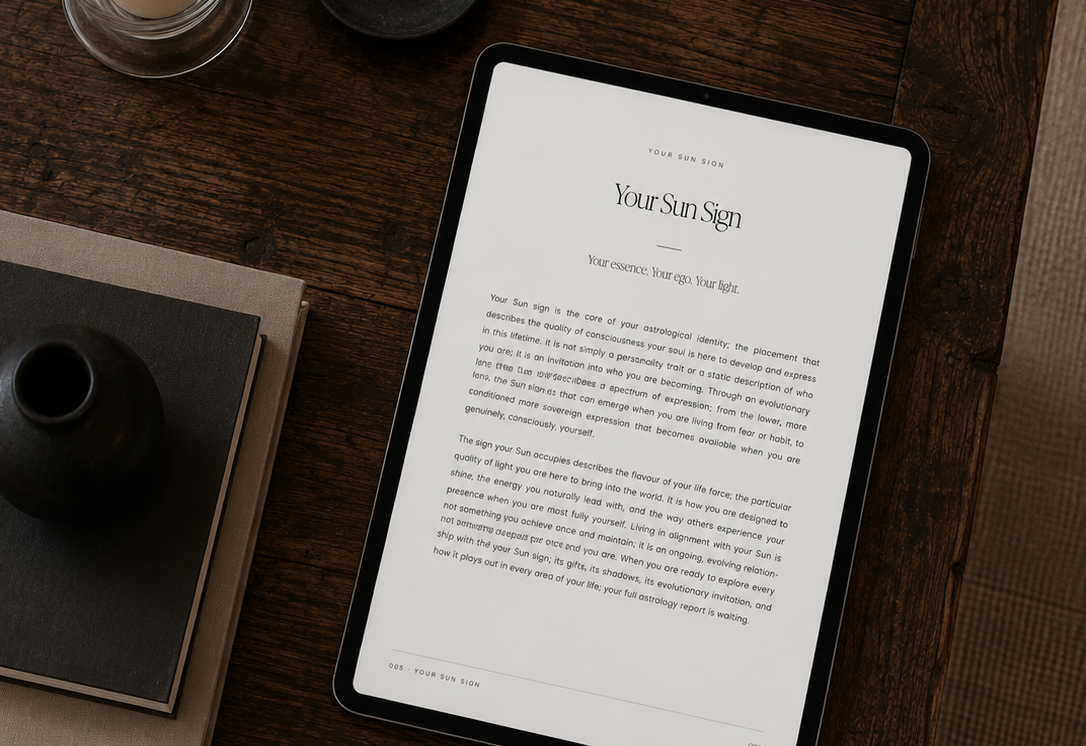 An Astrology Guide open on a tablet, showing the Your Sun Sign page